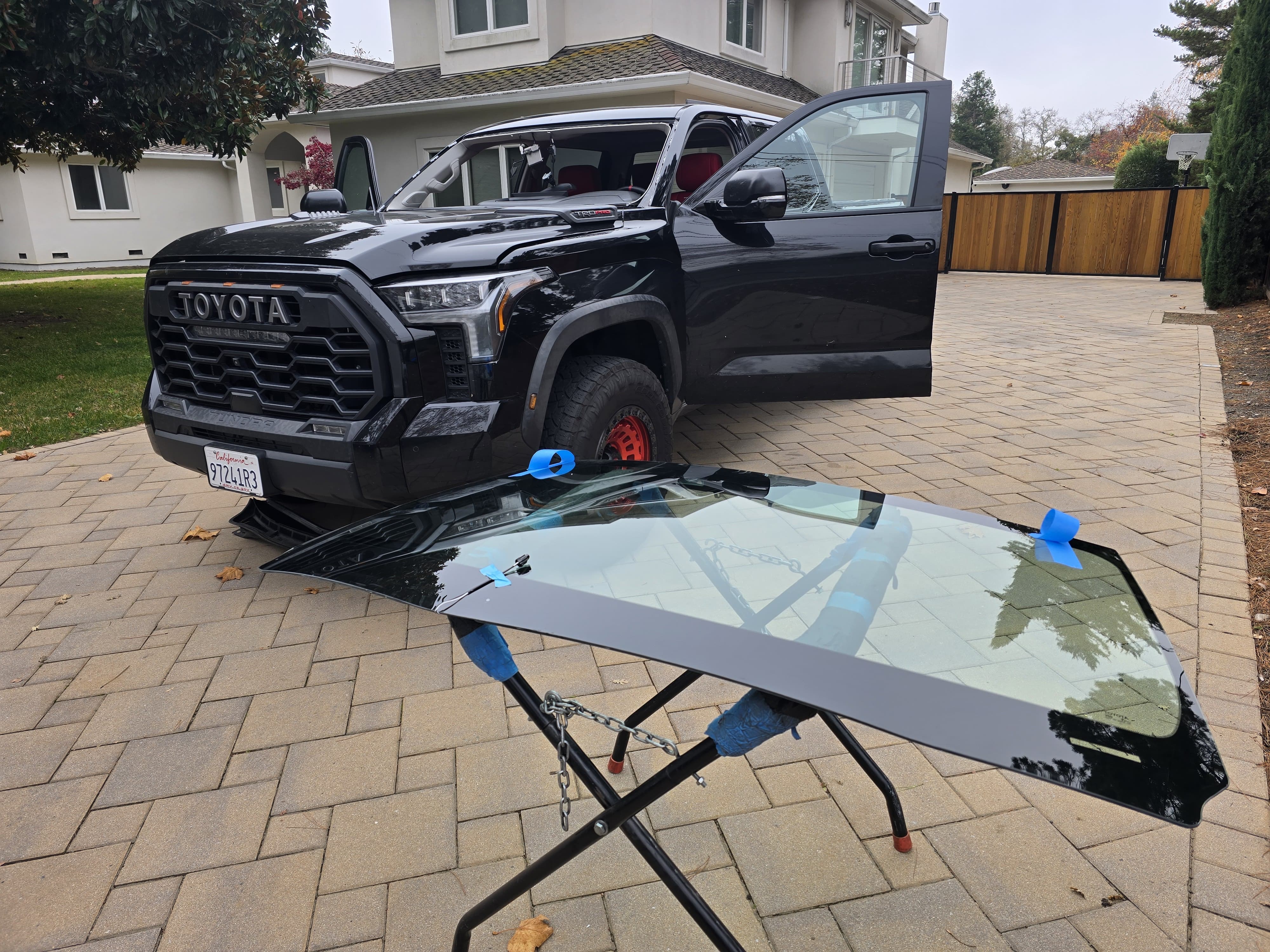 Black Toyota Tundra TRD Pro with windshield removed during mobile windshield replacement service by Auto Glass of Scottsdale